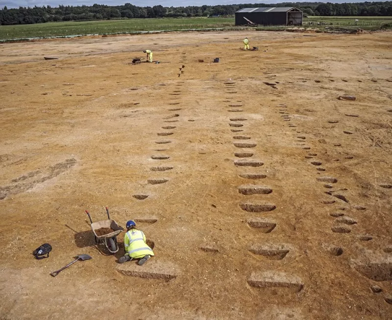 Archaeological excavation by Oxford Archaeology of an alignment of prehistoric pits